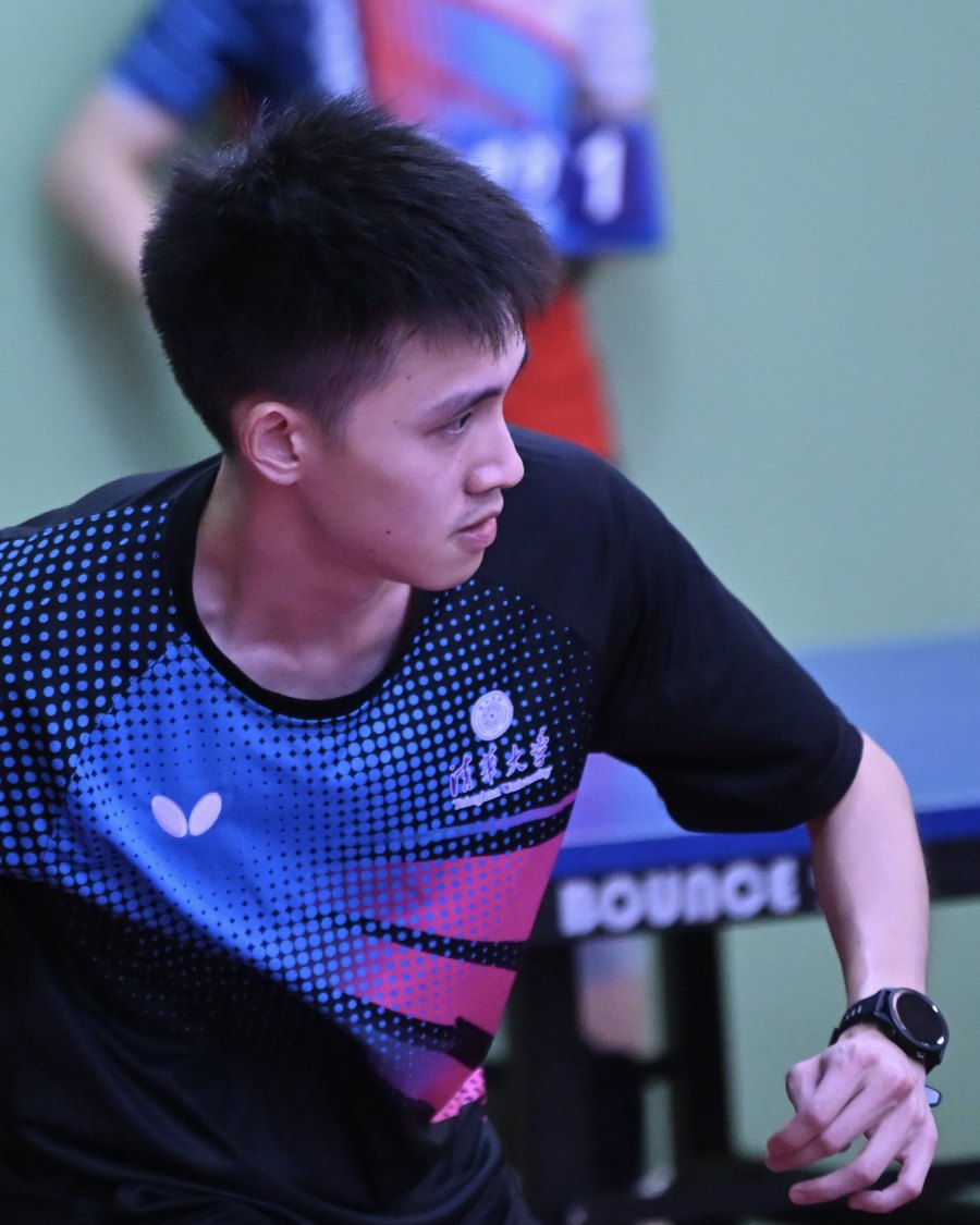 Tianchu Zeng playing table tennis during a match